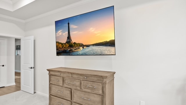 Clean TV wall mount above dresser in a bright bedroom — professional installation by Radiant TV Installations, Gwinnett County, GA