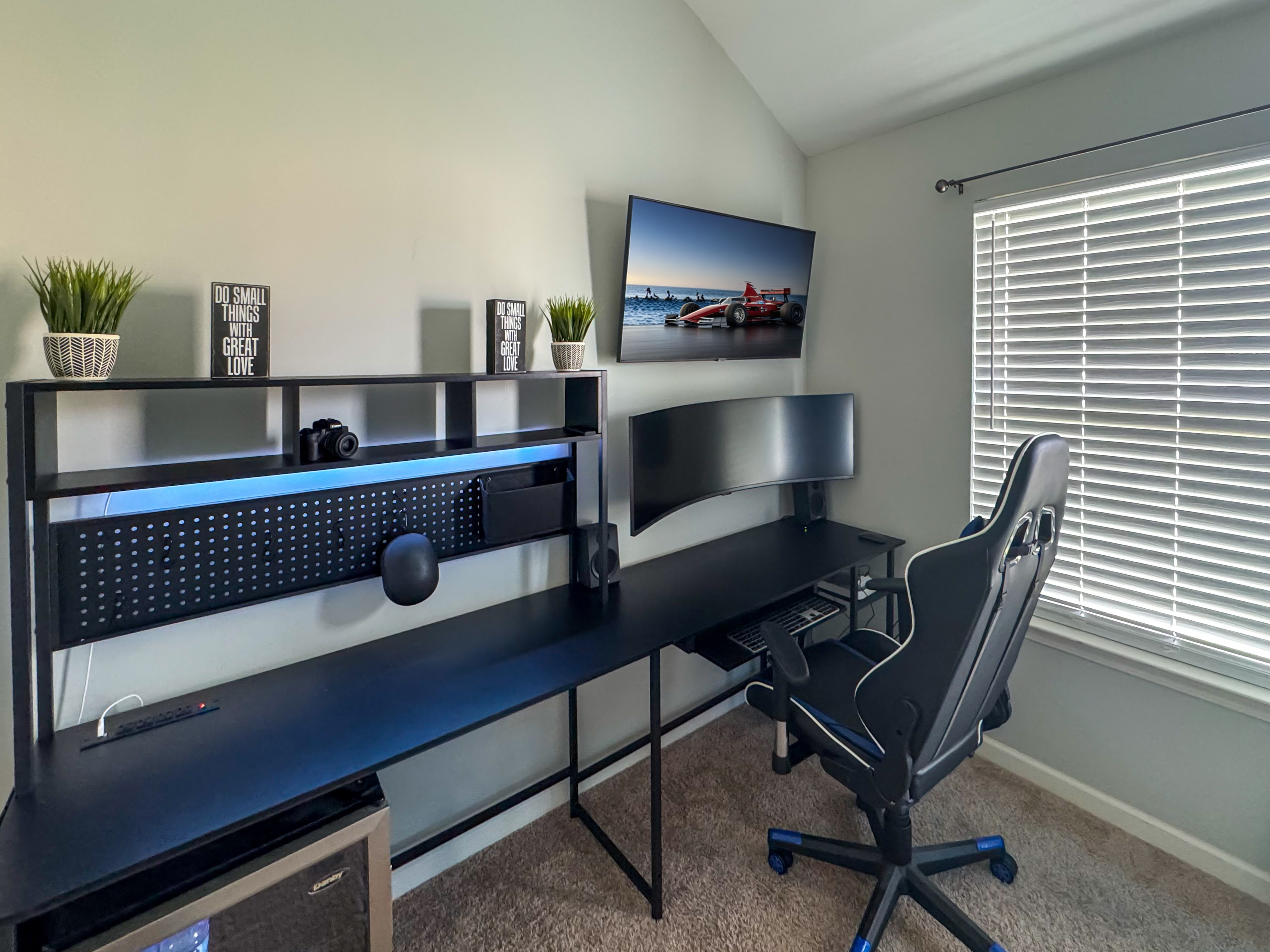 Professional TV wall mount installation in a gaming and home office setup in Gwinnett County, GA