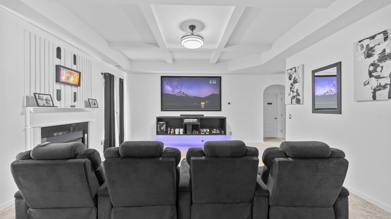 Custom home theater TV installation with recliners by Radiant TV Installations in Gwinnett County, GA